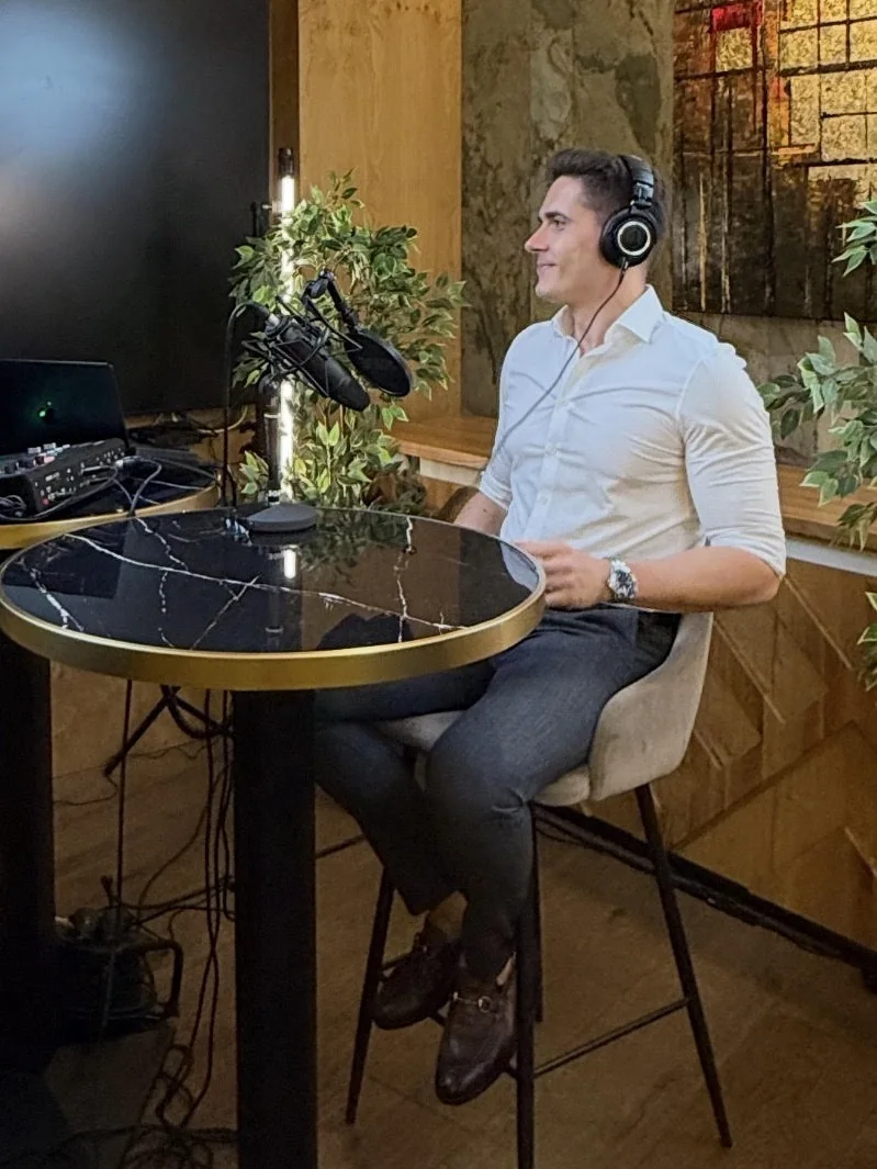Csaba Borzási recording a podcast